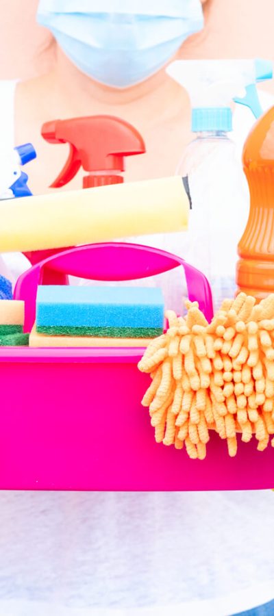 caucasian-woman-holding-basin-with-cleaning-suppli-2023-11-27-05-31-53-utc